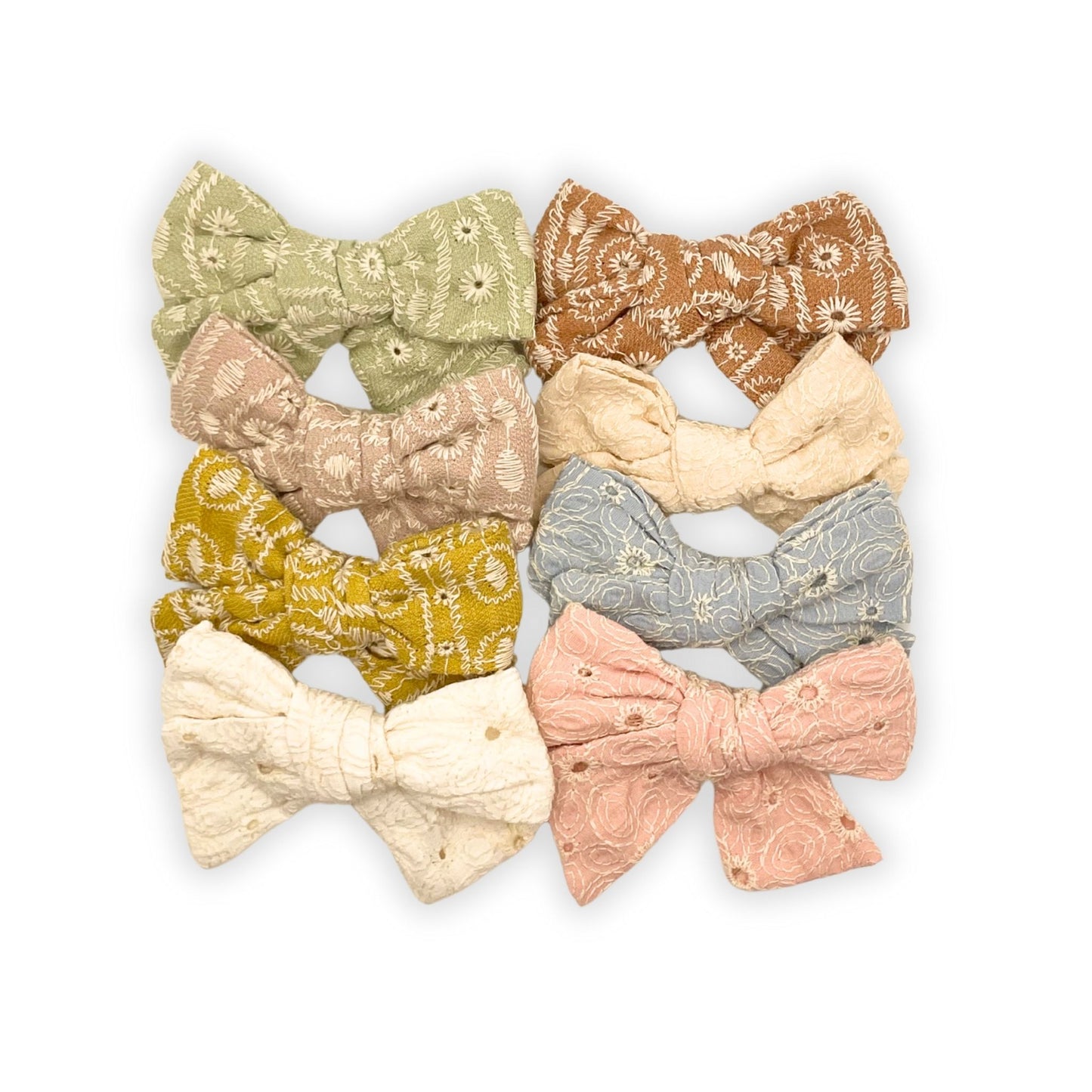 Stylish hair bows for kids featuring boho colors, perfect for adding flair and fun to any hairstyle or outfit.