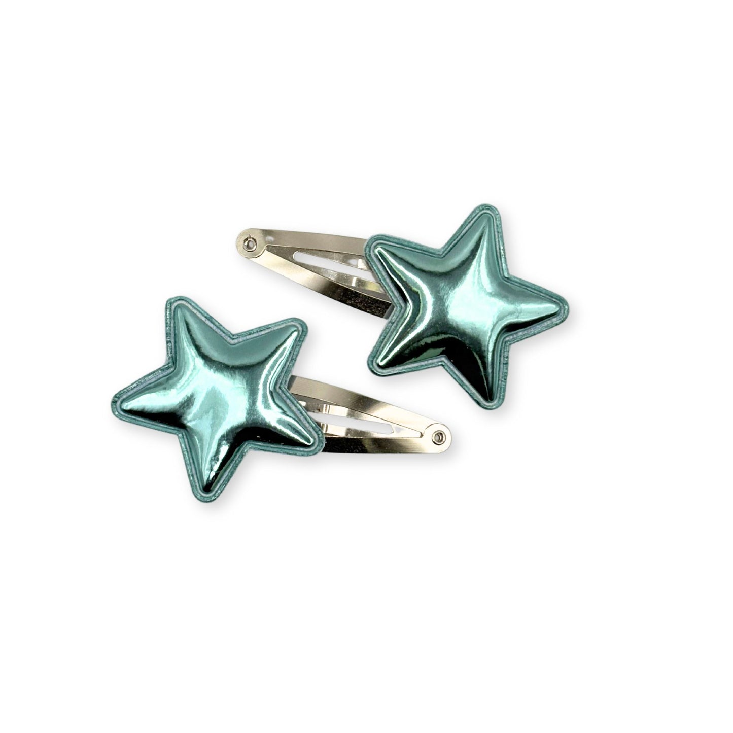 Shiny star-shaped hair clips in metallic finishes, great for parties, school, or playful everyday hairstyles.