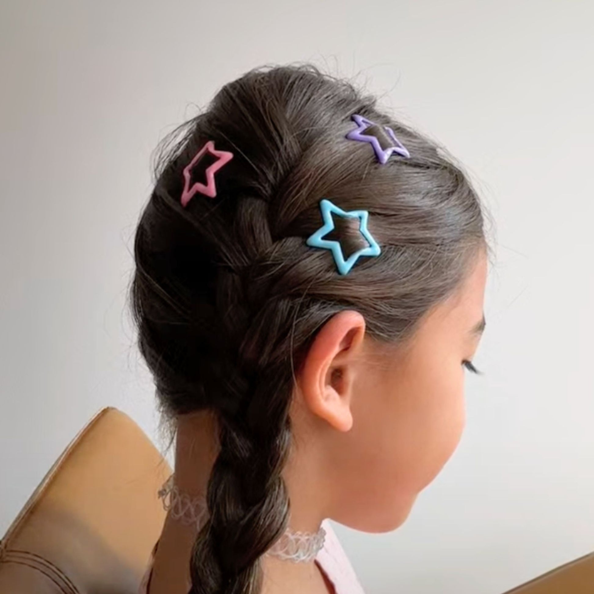 Add a playful touch to your look with our multicolor star snap hair clips and barrettes. A secure hold and vibrant, fun designs perfect for all hair types and occasions.
