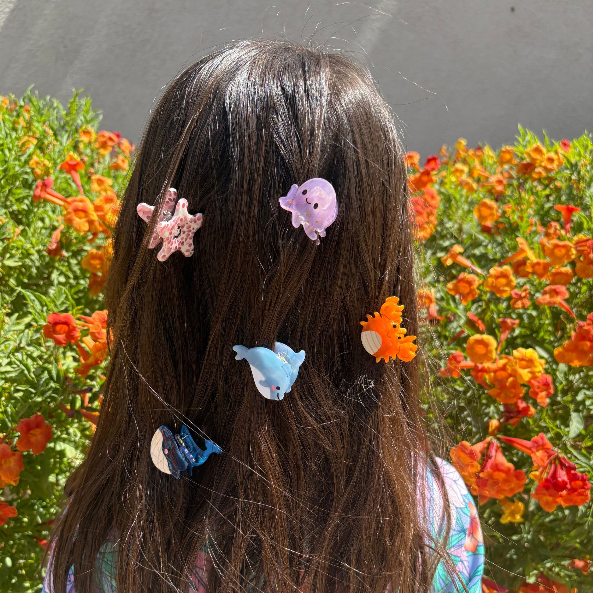 Ocean animal hair claws featuring crab, whale, dolphin, starfish, and octopus designs.