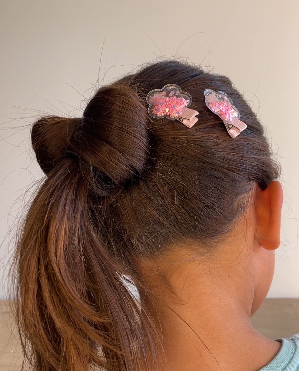 Flower confetti hair clips, with vibrant, multicolored flower designs for a secure hold and playful look.