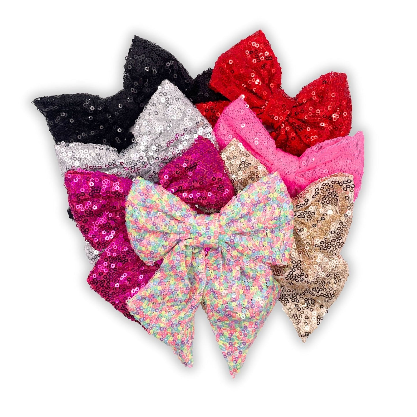 Fun and glamorous kids sequin hair bow, great for adding charm and sparkle to your child's look for any celebration.