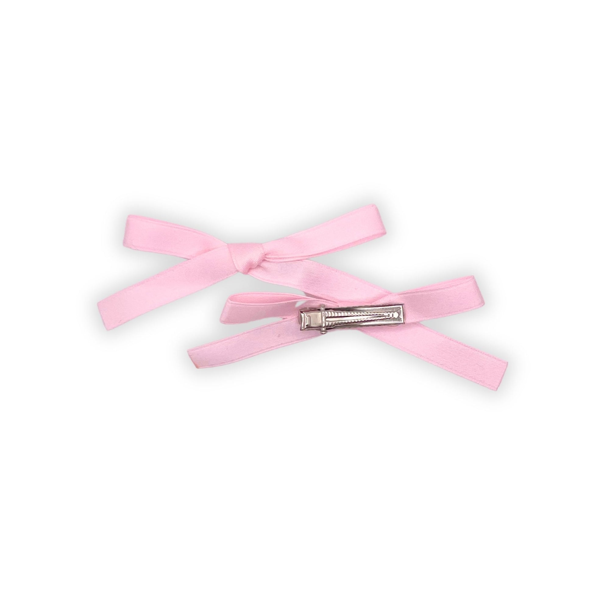 Satin hair bow clips for girls, designed to hold hair in place with style. Great accessory for any outfit or event.