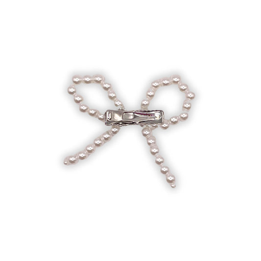 Pearl hair bow clip, ideal for special occasions and everyday wear, adding a fancy touch.